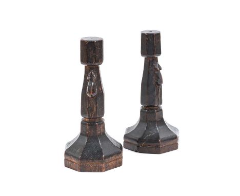 Robert Mouseman Thompson (1876-1955): A Pair of English Oak Candlesticks, of octagonal form, each with carved mouse trademark