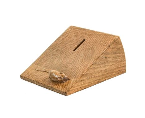 Workshop of Robert Mouseman Thompson (Kilburn): An English Oak Wedge of Cheese Money Box, with carved mouse trade mark on top
