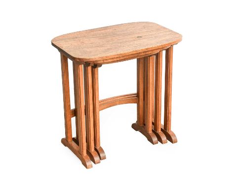 Stanley Webb Davies (1894-1978) of Windermere: A Walnut Nest of Three Tables, 1957, shaped rectangular tops, on four legs joi