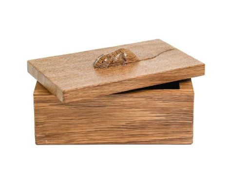 Workshop of Robert Mouseman Thompson (Kilburn): An English Oak Trinket Box and Cover, of rectangular form, the cover with car
