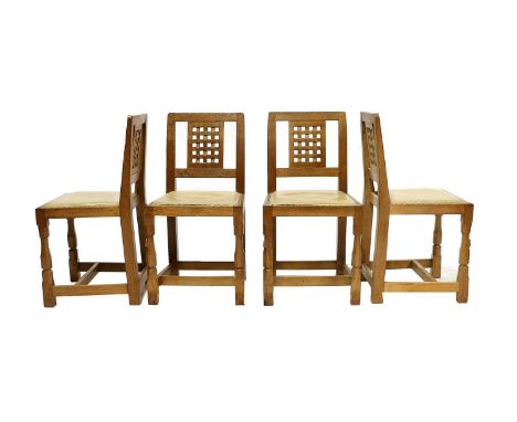 Workshop of Robert Mouseman Thompson (Kilburn): A Set of Four English Oak Lattice Back Dining Chairs, 1969, cream leather uph