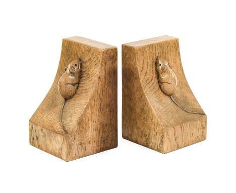 Workshop of Robert Mouseman Thompson (Kilburn): A Pair of English Oak Single Mouse Bookends, each with carved mouse trademark