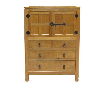 Workshop of Robert Mouseman Thompson (Kilburn): An English Oak Tallboy, 2016, adzed top, above two cupboard doors with wrough