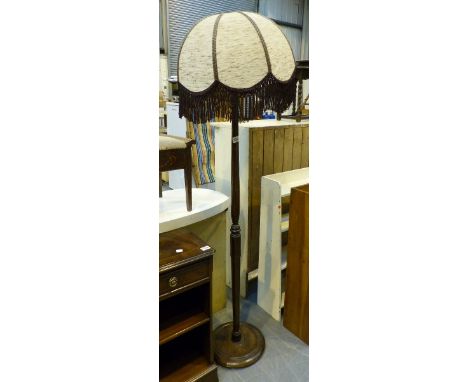 Large dark mahogany standard lamp with shade. 