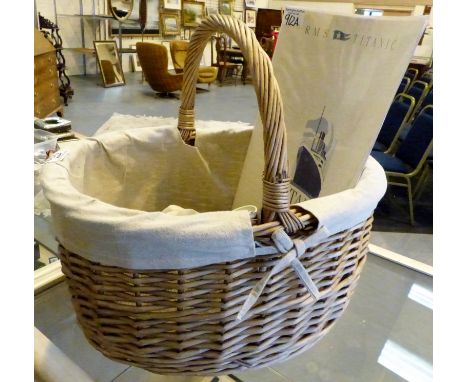 Basket of Laura Ashley items including Rose curtain tie backs. 