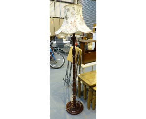 Mahogany standard lamp with barley twist stem and shade.