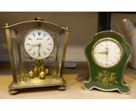 Brass anniversary clock and a Swiss musical alarm clock