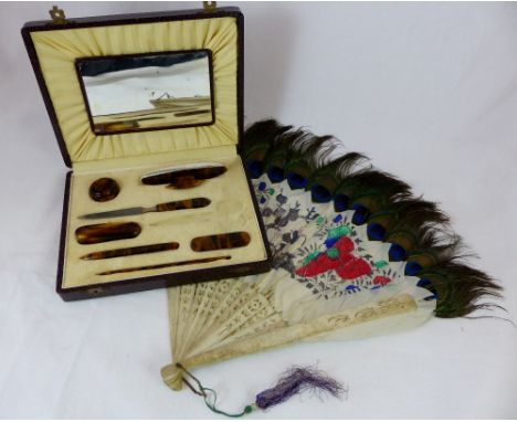 Bakelite vanity case with mirror, lacking scissors and Bone peacock feather fan