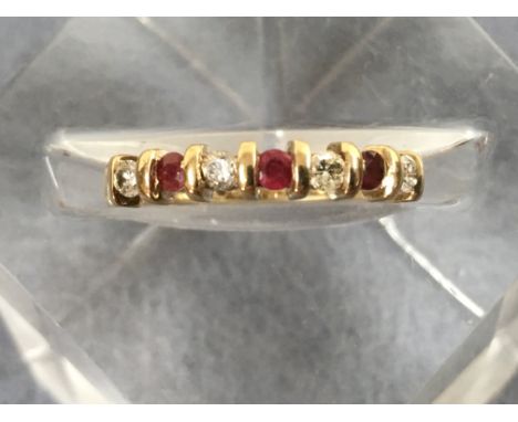 A 9ct gold ruby and diamond half hoop eternity ring