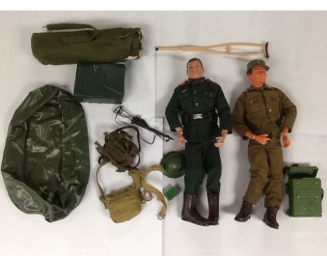 2 action man figures, one dressed as a nazi in full uniform and the other a British soldier, together with a large amount of 