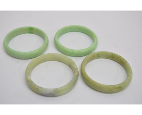 Four Jade type bangles
