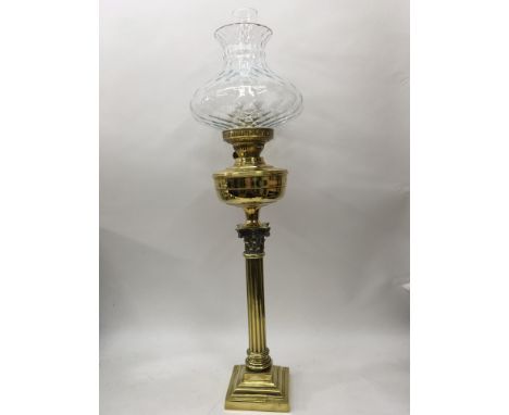 A brass Corinthian column lamp.