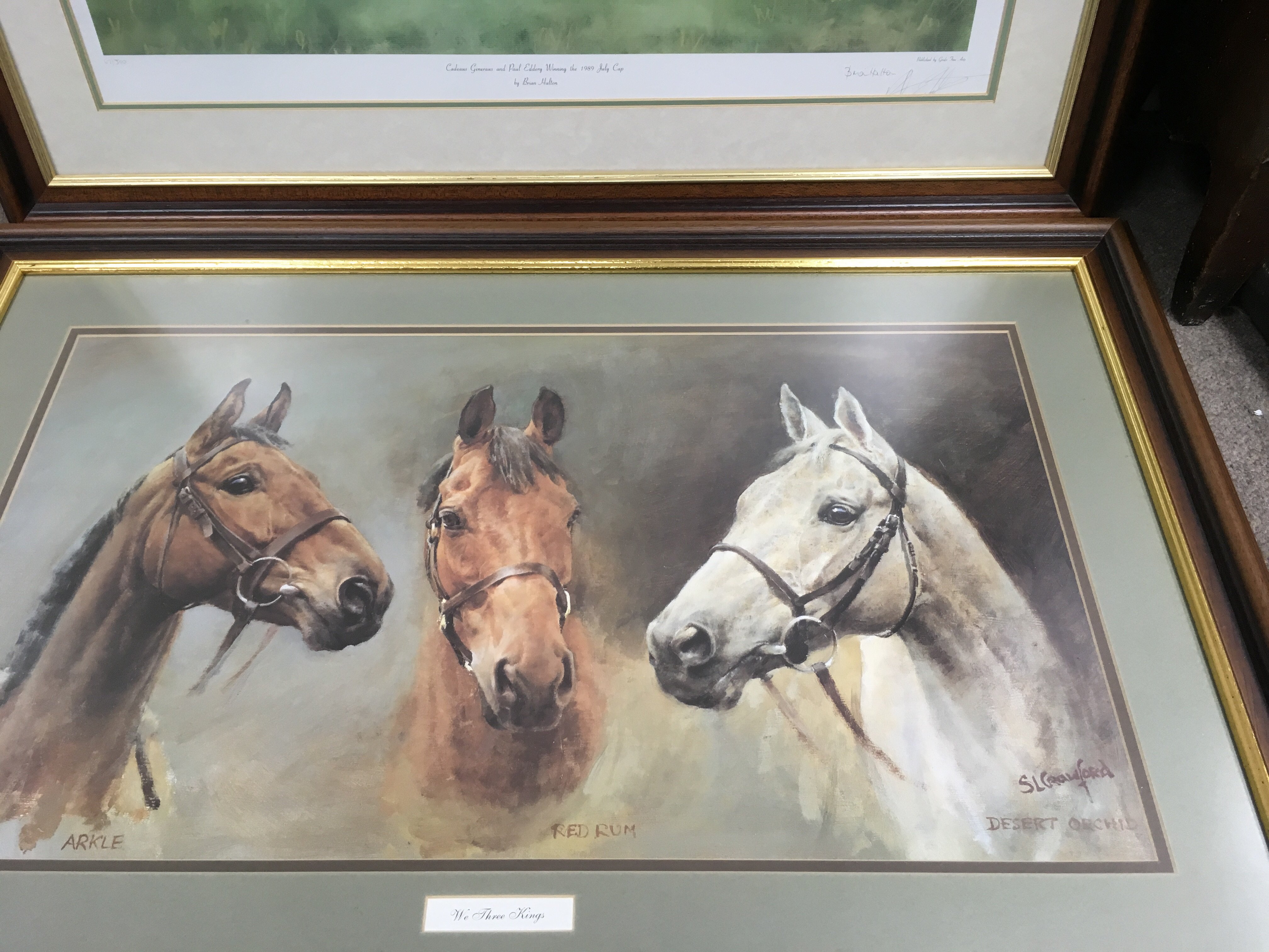 Two large framed horse racing prints comprising a S.Crawford 'We Three Kings' study and a limited