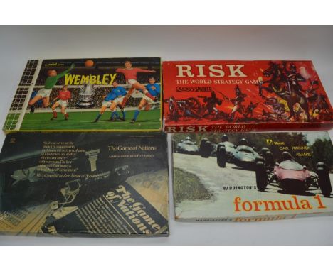 A collection of board games including Wembley, Risk, Formula 1, Trek, Magic Robot etc