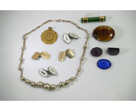 A vintage gold and Jade brooch various unmounted Jewellery