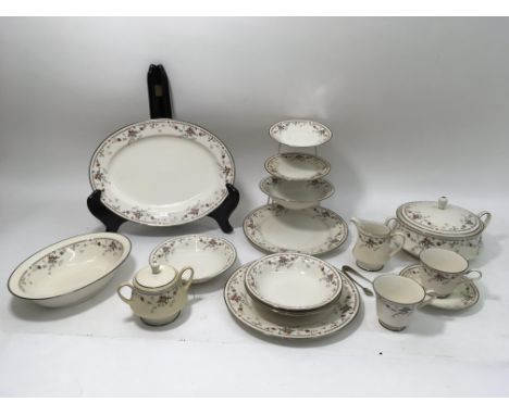 Noritake tea & dinner service in ivory china decorated with foliage in red brick and grey colours.