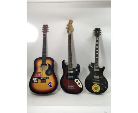 Three vintage guitars, one Grant electric, one Grant bass and a Chantry acoustic.