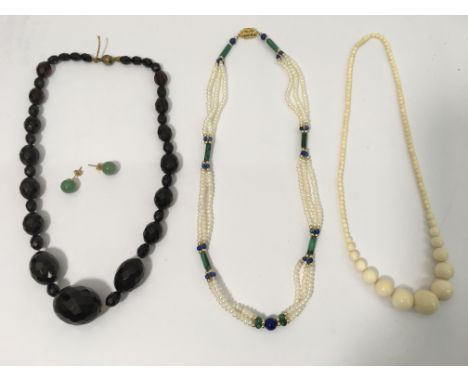 A Lapis, Malachite and Pearl necklace, an ivory necklace and a pair of jade earrings.