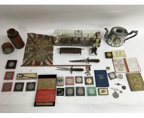 A collection of various medals, silver jubilee coach, an engraved silver plated Victorian tea pot, Chinese fortune sticks, In