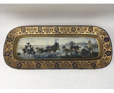 A Zsolnay Pecs dish possibly depicting a revolutionary scene, approx length 60th.