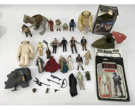 A collection of loose vintage Star Wars figures, a carded Snowtrooper, mini rigs etc.