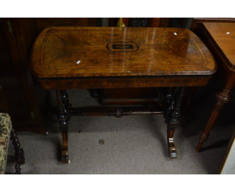 A Quality Victorian burr walnut and inlaid card table the twin flap top on turned legs united by stretchers,