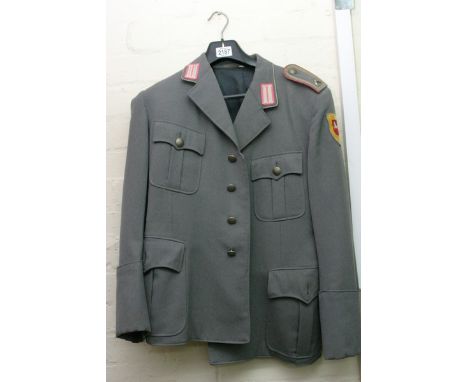 A vintage Peter Kupper German police dress jacket and side cap (2).