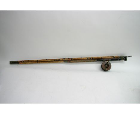 A old vintage cane rod with reel