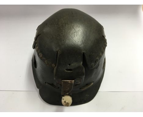 Vintage coal miners helmet with candle