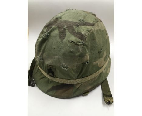A US army Vietnam era helmet.