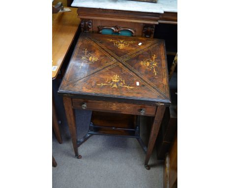 An Edwardian inlaid Rosewood envelope card table, with a single drawer on square legs.