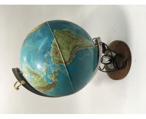 An electric light up globe, approximately 18inches in height.