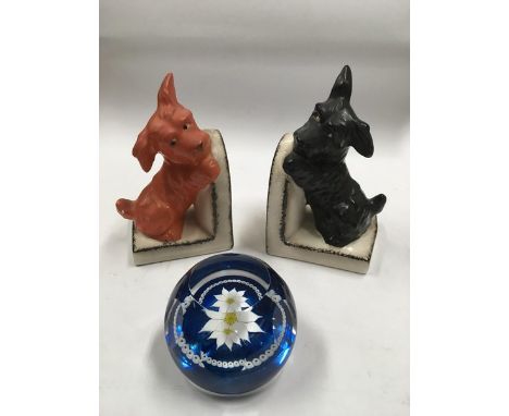 A pair of Goebel book ends in the form of dogs plus a Caithness paperweight (3).