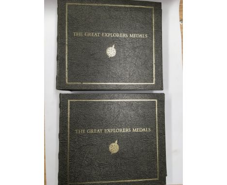 Two albums containing limited edition sterling silver 'The great explorers medals' plus two 1987 UK uncirculated coin collect