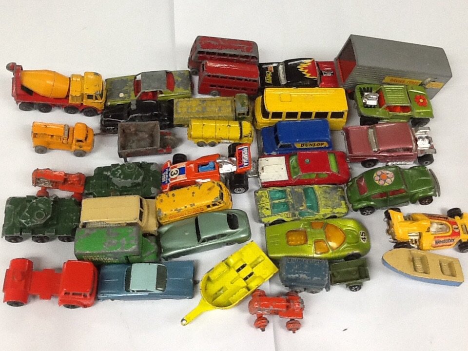 A Small Collection Of Unboxed Matchbox 1-75 Model Vehicles And Others.