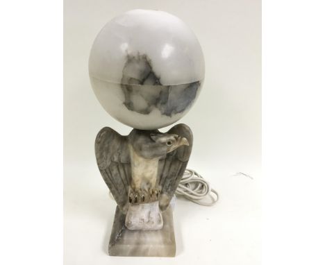 An Art Deco style white onyx table lamp, formed as an eagle. Approximately 35cm