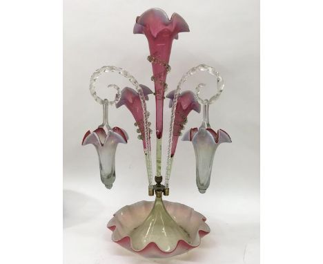 A cranberry epergne approx 54cm in height.
