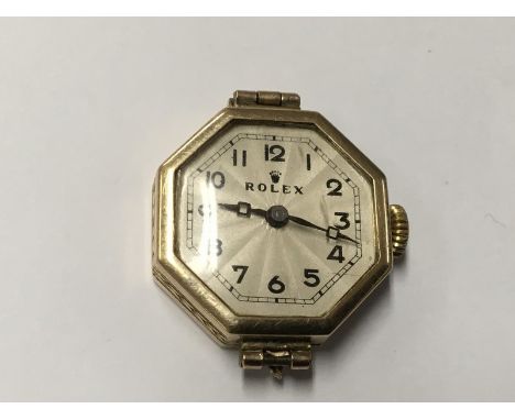 A vintage gold 9ct cased lady's Rolex watch of Octagonal shape.