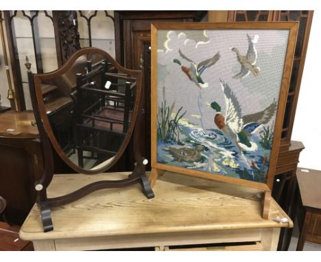 A 19th Century shield shaped mirror approx 57cm x 42cm and a tapestry fire screen depicting ducks, approx 65.5cm x 48cm (2).