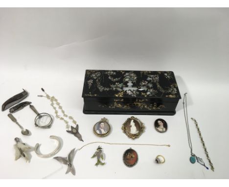 A mother of pearl jewellery box and contents including a cameo brooch, painted ceramic portrait and Scandinavian enamel jewel