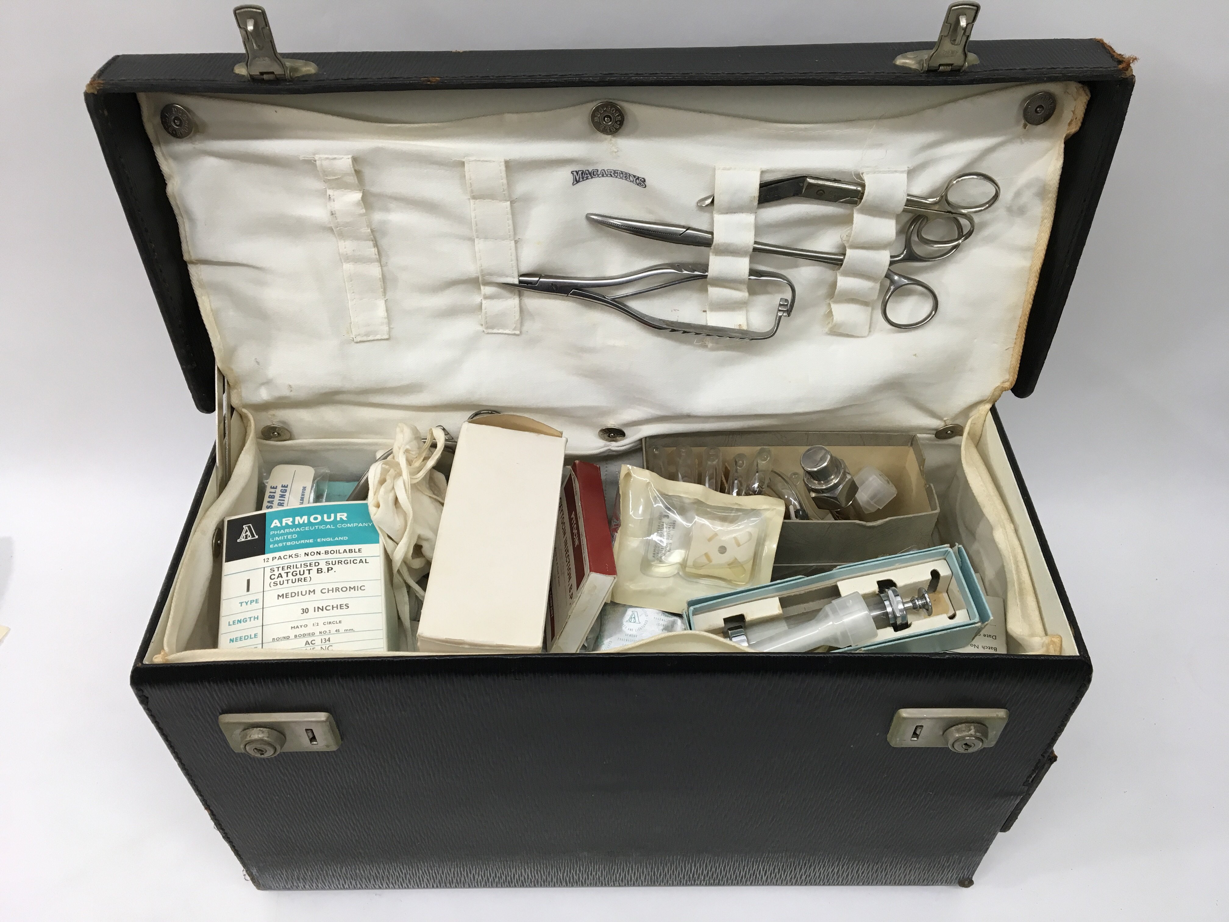 A doctors bag with contents possibly from the 1950's/60's