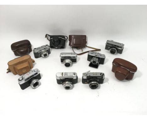 A collection of late 1950's and 1960's 35mm film cameras including Agfa Solinette, Voigtlander Vito, Yashica Minister, a Graf