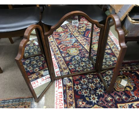 A vintage wood framed triple dressing mirror