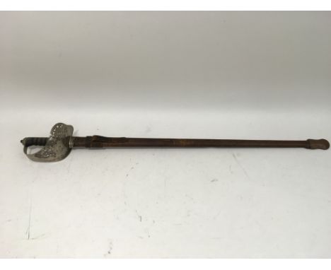 A Henry Wilkinson sword and scabbard.