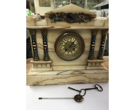 A French 15 day Onyx and enamel mantle clock Dated 1898 with original receipt and keys and pendulum.
