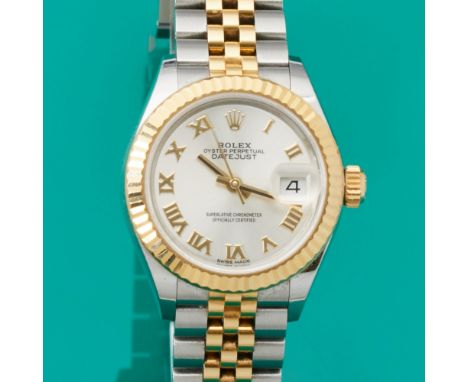 ROLEX - DamenarmbanduhrFa. Rolex, Swiss Modell: Lady-Datejust. Edelstahl und 750/- Gelbgold. Gewicht: 79,1 g. Auf dem Zifferb