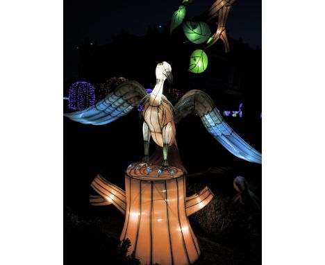 A hand crafted Chinese silk lantern in the form of a Vulture.
The lantern stands 170 cm (including the stump on which it perc