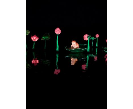 A hand crafted Chinese silk lantern in the form of a Frog
The frog sits on a Lilly pad, and is constructed to float on the wa