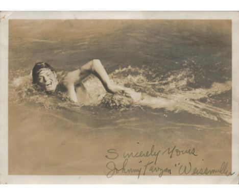 Johnny Weissmuller signed 7x5 inch Tarzan sepia vintage photo. Good condition. All autographs are genuine hand signed and com
