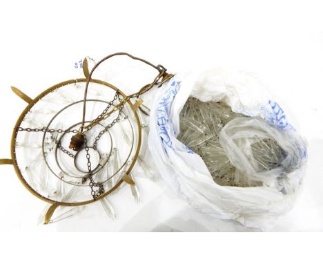 Gilt metal ceiling light hung with four tiers of glass lustres 